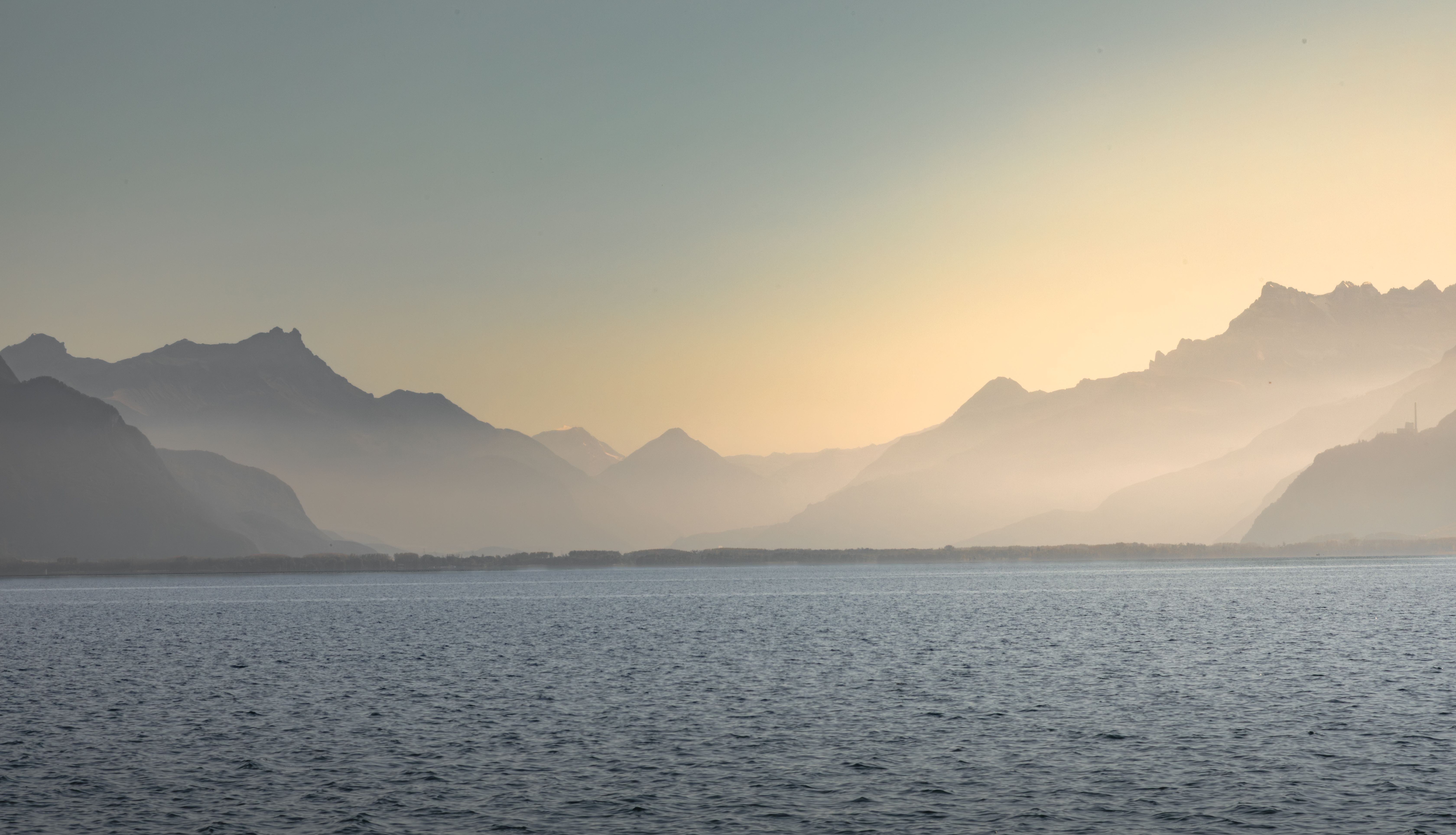 Misty mountains across Lake Geneva from the Vevey area